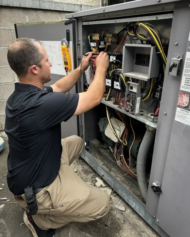 A technician from Cornerstone Air works on a customer's unit.